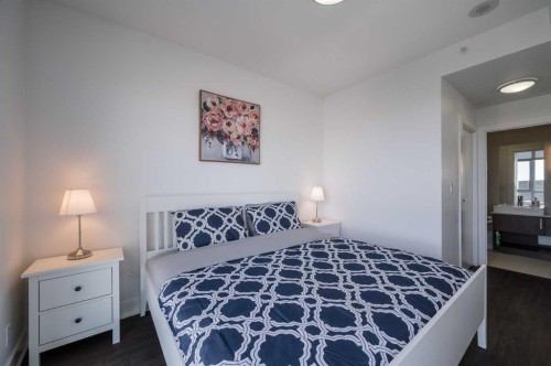 1205-550 Riverfront Avenue Se, Calgary, AB - Indoor Photo Showing Bedroom