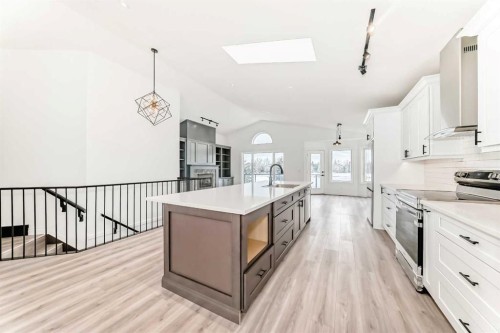 228 Woodside Crescent Nw, Airdrie, AB - Indoor Photo Showing Kitchen With Upgraded Kitchen