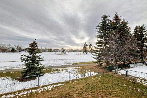 228 Woodside Crescent Nw, Airdrie, AB - Outdoor With Body Of Water With View