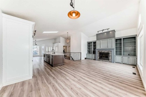 228 Woodside Crescent Nw, Airdrie, AB - Indoor With Fireplace