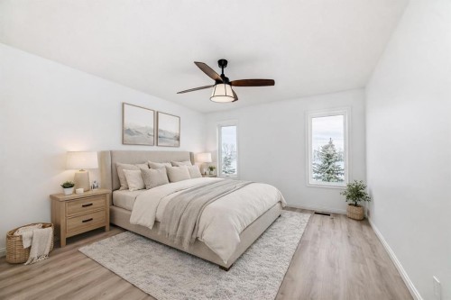 228 Woodside Crescent Nw, Airdrie, AB - Indoor Photo Showing Bedroom