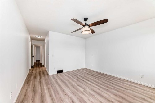 228 Woodside Crescent Nw, Airdrie, AB - Indoor Photo Showing Other Room
