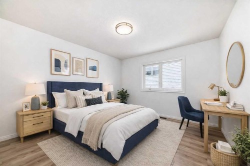 228 Woodside Crescent Nw, Airdrie, AB - Indoor Photo Showing Bedroom