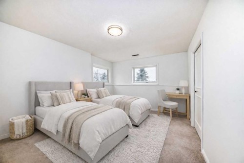 228 Woodside Crescent Nw, Airdrie, AB - Indoor Photo Showing Bedroom