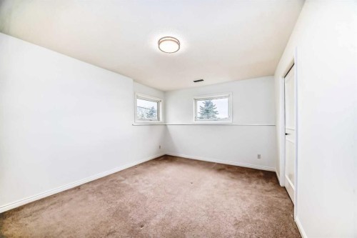 228 Woodside Crescent Nw, Airdrie, AB - Indoor Photo Showing Other Room