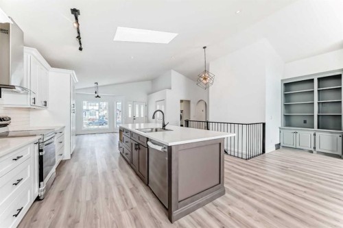 228 Woodside Crescent Nw, Airdrie, AB - Indoor Photo Showing Kitchen With Upgraded Kitchen
