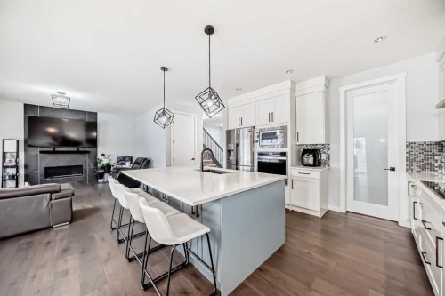 2 Chelsea Bay, Chestermere, AB - Indoor Photo Showing Kitchen With Upgraded Kitchen