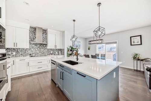 2 Chelsea Bay, Chestermere, AB - Indoor Photo Showing Kitchen With Upgraded Kitchen