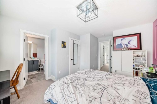 2 Chelsea Bay, Chestermere, AB - Indoor Photo Showing Bedroom