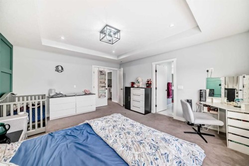 2 Chelsea Bay, Chestermere, AB - Indoor Photo Showing Bedroom