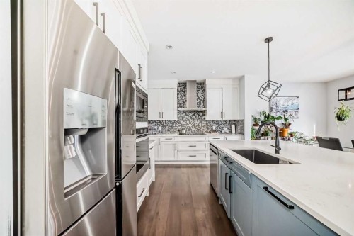 2 Chelsea Bay, Chestermere, AB - Indoor Photo Showing Kitchen With Upgraded Kitchen
