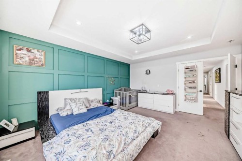 2 Chelsea Bay, Chestermere, AB - Indoor Photo Showing Bedroom