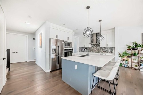 2 Chelsea Bay, Chestermere, AB - Indoor Photo Showing Kitchen With Stainless Steel Kitchen With Upgraded Kitchen
