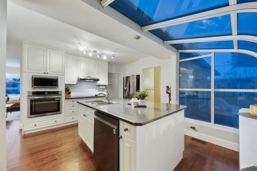 35 Grafton Drive Sw, Calgary, AB - Indoor Photo Showing Kitchen With Upgraded Kitchen