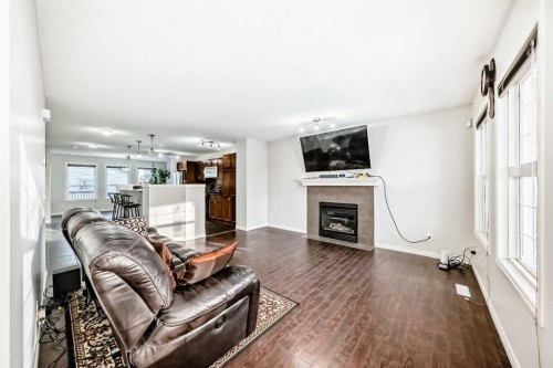 9275 Saddlebrook Drive Ne, Calgary, AB - Indoor Photo Showing Living Room With Fireplace
