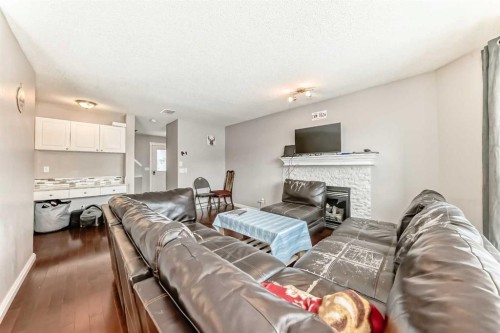 39 Saddleridge Close Ne, Calgary, AB - Indoor Photo Showing Living Room With Fireplace