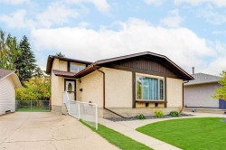 7 Woodmont Rise SW Calgary, AB T2W 4L4