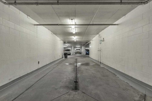 544-222 Riverfront Avenue Sw, Calgary, AB - Indoor Photo Showing Garage