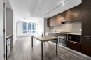 544-222 Riverfront Avenue Sw, Calgary, AB  - Indoor Photo Showing Kitchen With Upgraded Kitchen 