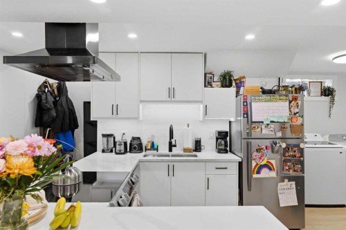7107 54 Avenue Nw, Calgary, AB - Indoor Photo Showing Kitchen With Double Sink