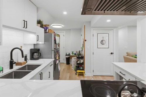 7107 54 Avenue Nw, Calgary, AB - Indoor Photo Showing Kitchen With Double Sink