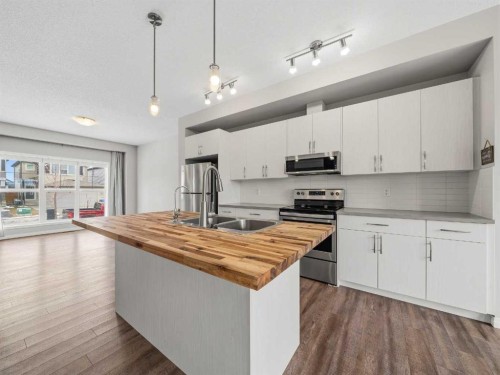 89 Walgrove Rise Se, Calgary, AB - Indoor Photo Showing Kitchen With Stainless Steel Kitchen With Double Sink
