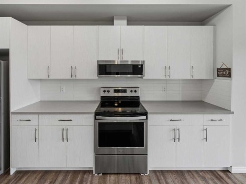 89 Walgrove Rise Se, Calgary, AB - Indoor Photo Showing Kitchen With Stainless Steel Kitchen