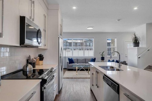 178 Dawson Way, Chestermere, AB - Indoor Photo Showing Kitchen With Stainless Steel Kitchen With Double Sink With Upgraded Kitchen