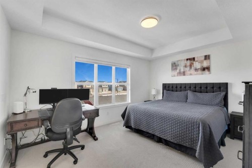 178 Dawson Way, Chestermere, AB - Indoor Photo Showing Bedroom