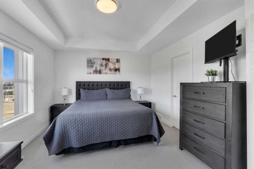 178 Dawson Way, Chestermere, AB - Indoor Photo Showing Bedroom