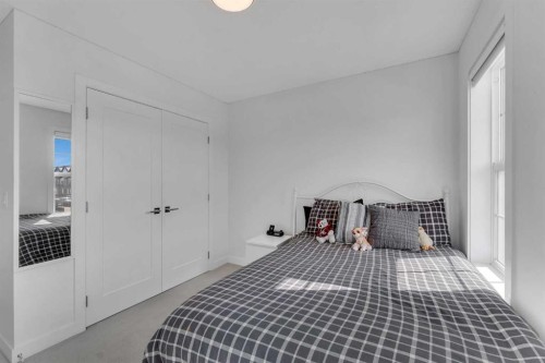 178 Dawson Way, Chestermere, AB - Indoor Photo Showing Bedroom