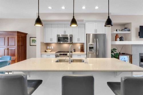 376 Quarry Park Boulevard Se, Calgary, AB - Indoor Photo Showing Kitchen With Stainless Steel Kitchen With Double Sink With Upgraded Kitchen