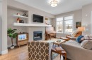376 Quarry Park Boulevard Se, Calgary, AB  - Indoor Photo Showing Living Room With Fireplace 
