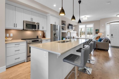 376 Quarry Park Boulevard Se, Calgary, AB - Indoor Photo Showing Kitchen With Stainless Steel Kitchen With Double Sink With Upgraded Kitchen
