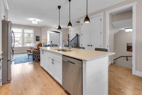 376 Quarry Park Boulevard Se, Calgary, AB - Indoor Photo Showing Kitchen With Double Sink