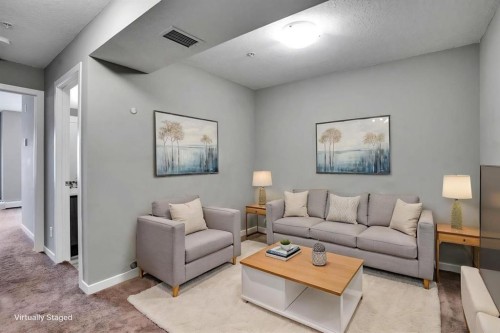 228-10 Westpark Link Sw, Calgary, AB - Indoor Photo Showing Living Room