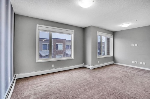 228-10 Westpark Link Sw, Calgary, AB - Indoor Photo Showing Other Room