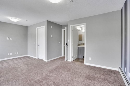 228-10 Westpark Link Sw, Calgary, AB - Indoor Photo Showing Other Room