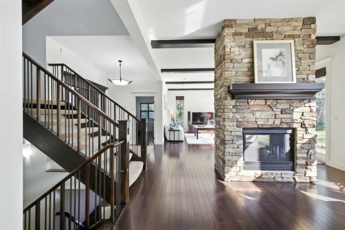 62 Posthill Drive Sw, Calgary, AB - Indoor With Fireplace