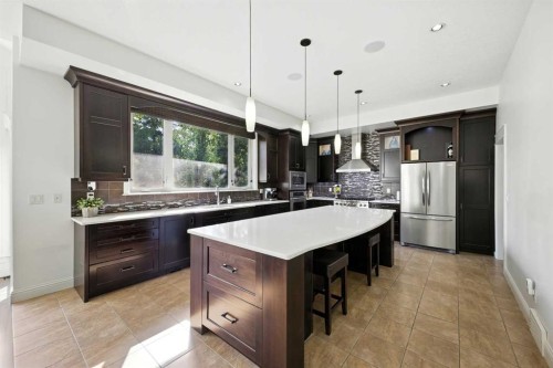 62 Posthill Drive Sw, Calgary, AB - Indoor Photo Showing Kitchen With Upgraded Kitchen