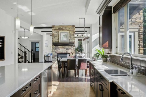 62 Posthill Drive Sw, Calgary, AB - Indoor Photo Showing Kitchen With Double Sink With Upgraded Kitchen