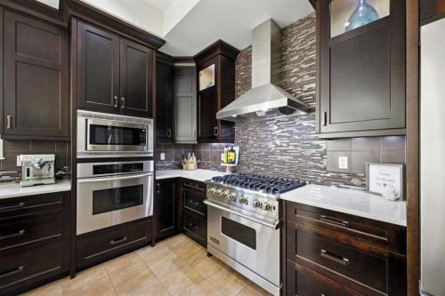 62 Posthill Drive Sw, Calgary, AB - Indoor Photo Showing Kitchen With Upgraded Kitchen