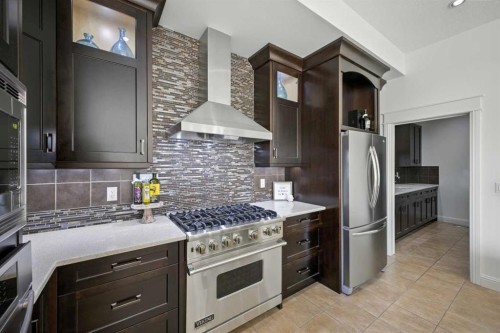 62 Posthill Drive Sw, Calgary, AB - Indoor Photo Showing Kitchen With Upgraded Kitchen