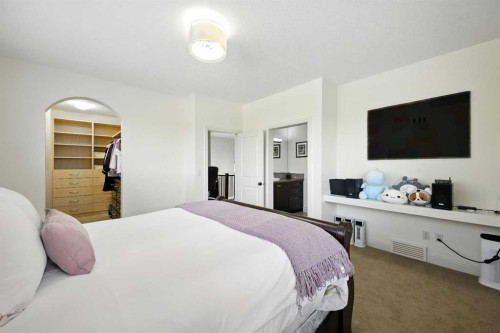 62 Posthill Drive Sw, Calgary, AB - Indoor Photo Showing Bedroom