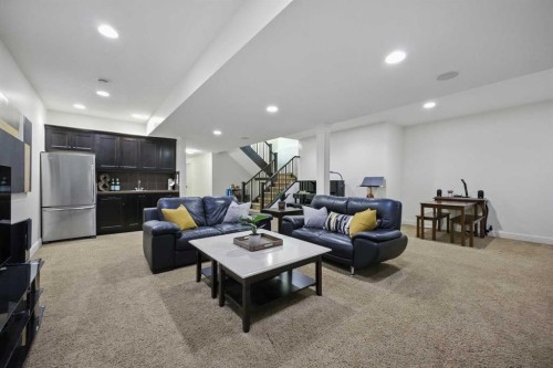 62 Posthill Drive Sw, Calgary, AB - Indoor Photo Showing Living Room