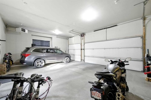 62 Posthill Drive Sw, Calgary, AB - Indoor Photo Showing Garage