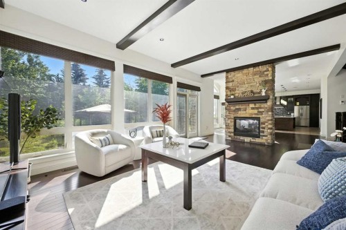 62 Posthill Drive Sw, Calgary, AB - Indoor Photo Showing Living Room With Fireplace