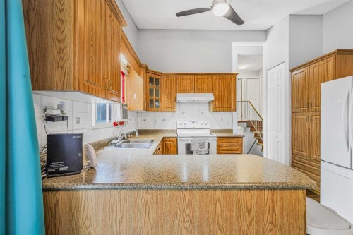 5112 Maryvale Drive Ne, Calgary, AB - Indoor Photo Showing Kitchen With Double Sink