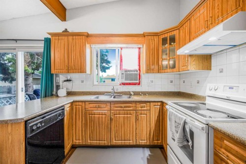 5112 Maryvale Drive Ne, Calgary, AB - Indoor Photo Showing Kitchen With Double Sink