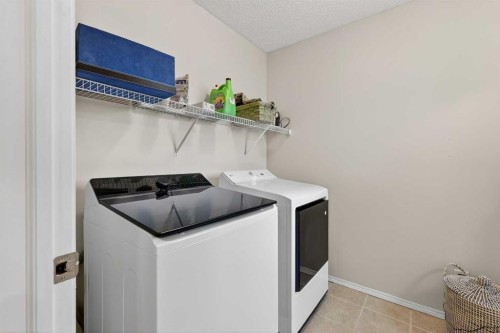 201 Autumn Circle Se, Calgary, AB - Indoor Photo Showing Laundry Room